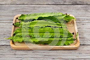 Psophocarpus tetragonolobus, Winged Bean on wood table