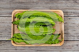 Psophocarpus tetragonolobus, Winged Bean on wood table