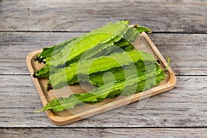 Psophocarpus tetragonolobus, Winged Bean on wood table