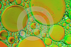 Psychedelic green and orange abstract background