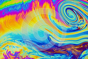 Psychedelic multicolored patterns background. Photo macro shot of soap bubbles