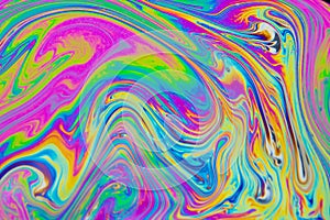 Psychedelic multicolored patterns background. Photo macro shot of soap bubbles