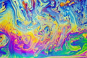 Psychedelic multicolored patterns background. Photo macro shot of soap bubbles