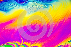 Psychedelic multicolored patterns background. Photo macro shot of soap bubbles