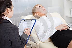 Psychiatrist examining patient