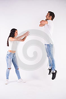 Psychological manipulation, relationship problems and female dominance concept - Young couple fighting. Woman controls a