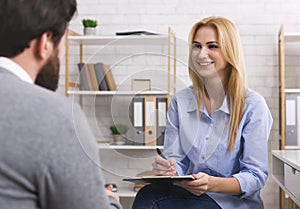 Psychologist having session with patient in office