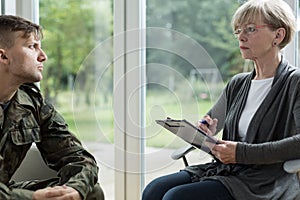 Psychologist helping soldier