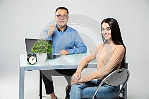 Psychologist listening to her patient and writing down notes. Mental health and counseling concept