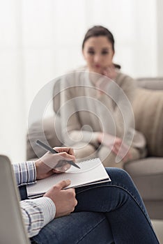 Psychologist listening to her patient photo