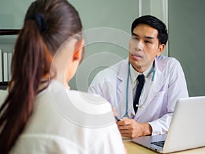 Psychologist metal health concept. Psychologist and depressed patient at office during consultation, The male doctor is treating