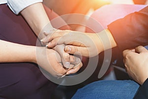 Psychologist session, close up on hands of doctor and patient, mental health, support and counseling concept