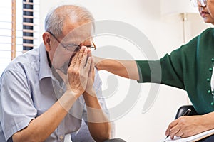 Psychology, depression people. Elderly asian patient man, male consult with psychologist, psychiatrist. Older doctor woman