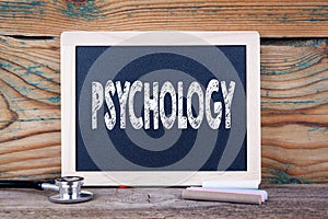 Psychology. Health concept. Chalkboard on a wooden background