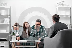 Psychology, mental family therapy, psychologist with family at psychotherapy session on psychological consultation