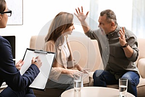 Psychotherapist working with couple. Family counselling