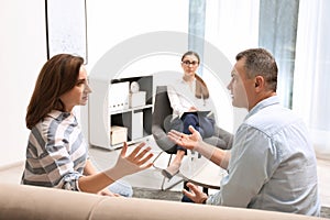 Psychotherapist working with couple. Family counselling