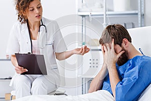 Psychotherapy nurse helping crying patient