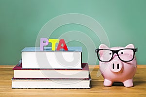 PTA theme with pink piggy bank with chalkboard