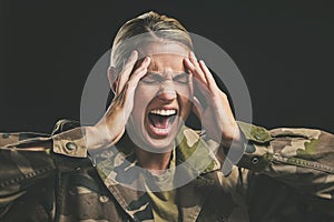 Ptsd, war and mental health with woman soldier suffering from trauma and flashback in a dark studio, stress and anxiety