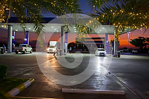 PTT gasstation. It is decorated with beautiful lights when the sun sets photo
