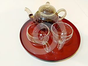 Pu& x27;er tea in pot with teacups