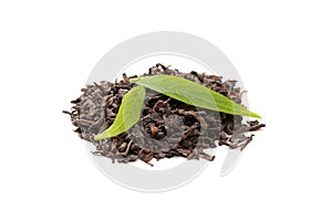 Pu-erh tea with fresh tea leaves on white