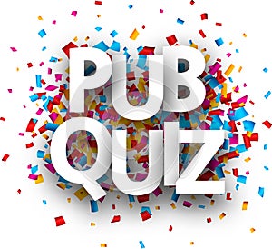 Pub quiz sign with colorful confetti. photo