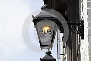 Pub sign on retro style lamp