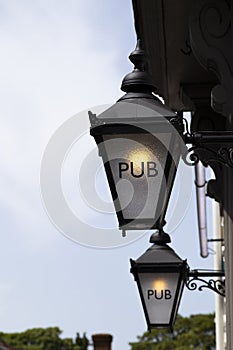 Pub sign on retro style lamp