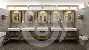 Public bathroom with five sinks, mirrors and soap dispensers. Modern and simple