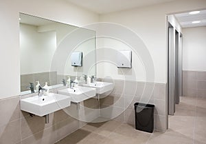 Public bathroom or restroom with hand basins