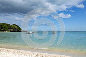 Public beach of Albion in Mauritius with cloudy sky background.