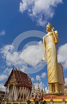 The public Buddha imagae statue tallest standing at wat Burapapiram temple Roiet, thailand