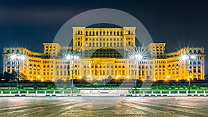 The public building of the Palace of the Parliament, by night, in Bucharest, Romania photo