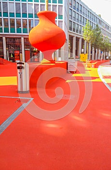 The Public City Lounge is in the open air covered in red rubber granulate and lit by artistic lighting elements in St. Gallen photo