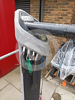 A Public Cycle Repair Station from the Left Side Showing Some of the Tools