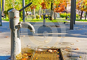 Public drinking water well hand pump