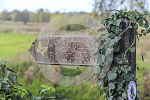 A public footpath directional sign on a nature walk in Essex