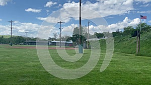 public park with feilds of grass, baseball diamond hilly slop and stairs