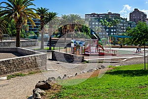 Public park with games for children on a sunny day in Tenerife. Canary Islands
