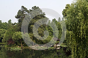 Public park with pond and garden in Hangzhou, China