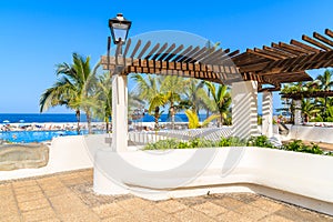 Public park with tropical gardens on coastal promenade in Puerto de la Cruz town, Tenerife, Canary Islands, Spain