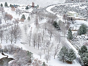 Public park in winter with snow on the ground