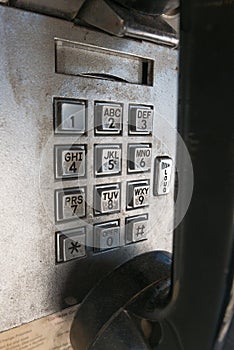 Public phone booth dial buttons
