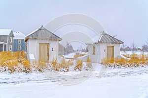 Public restrooms on a winter landscape in Daybreak