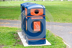 A public rubbish or trash bin used for recycling plastic bottles