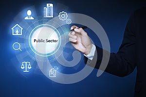 Public Sector concept. Man pointing at virtual screen with different icons on blue background, closeup