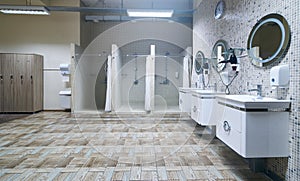 Public shower interior with everal showers