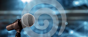 Public speaking backgrounds, Close-up the microphone on stand for speaker speech at seminar room